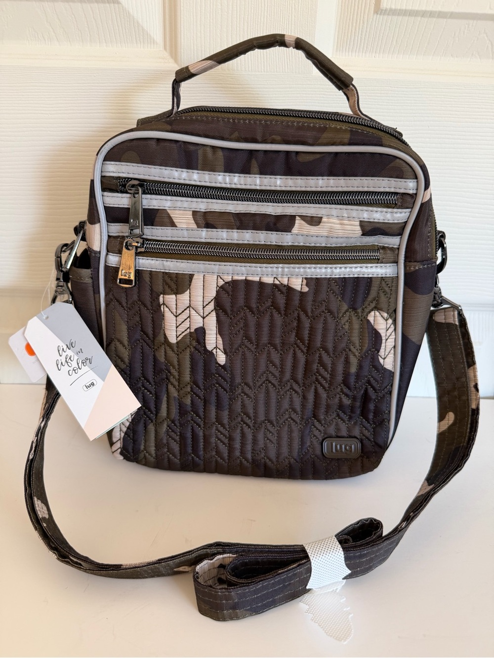 Lug Boxcar Crossbody bag. NWT. Green camo